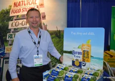 Will Ison with Earth Source Trading stands next to a display of Corona branded limes. The product launched at Giant Eagle this week.